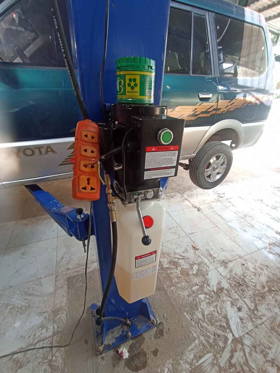 Bàn giao cầu nâng ô tô 2 trụ KONIA K-4000B cho anh Vĩnh ở huyện Hớn Quản, Bình Phước 14 cầu nâng ô tô 2 trụ konia k-4000b