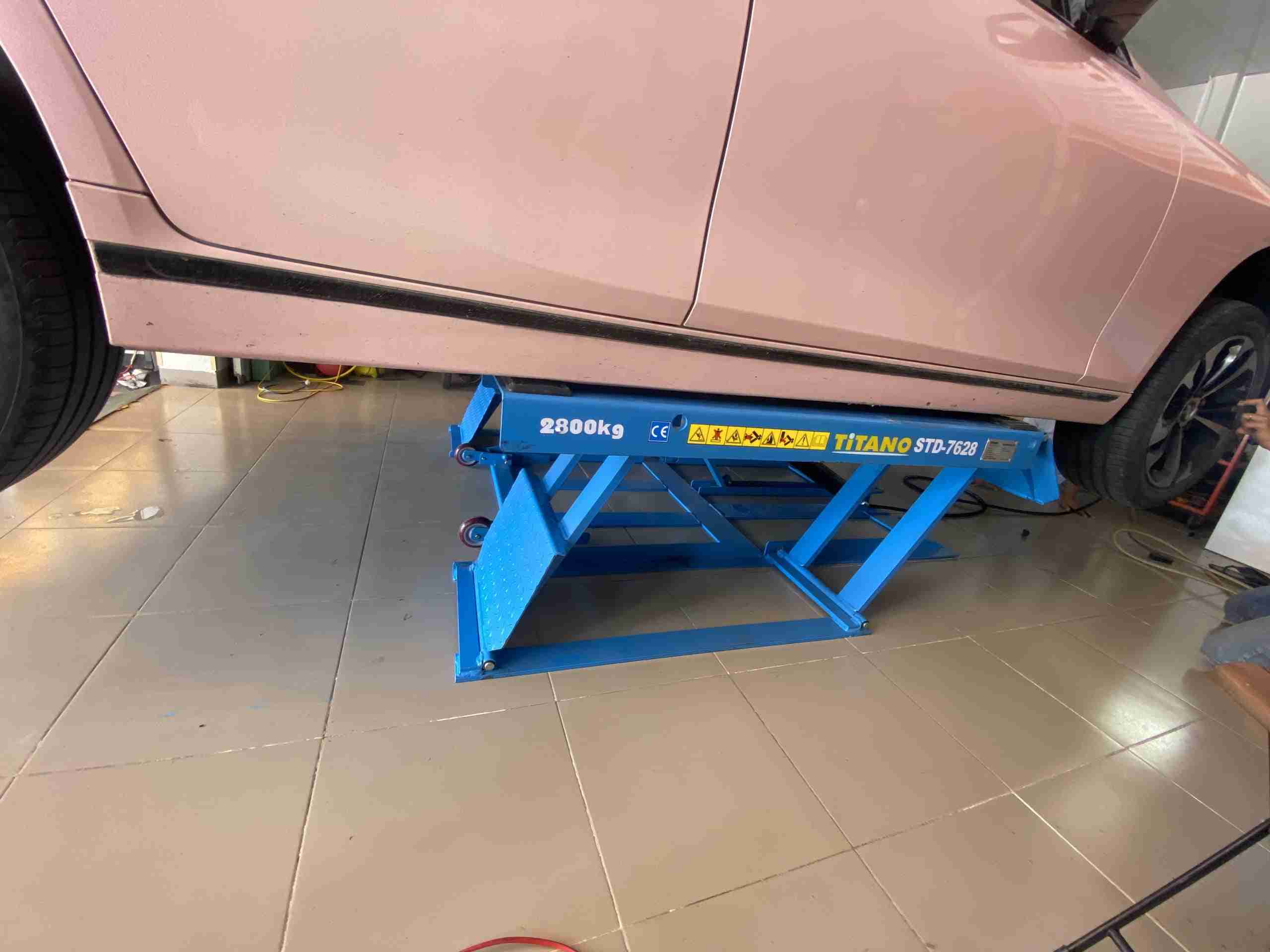 cầu nâng cắt kéo