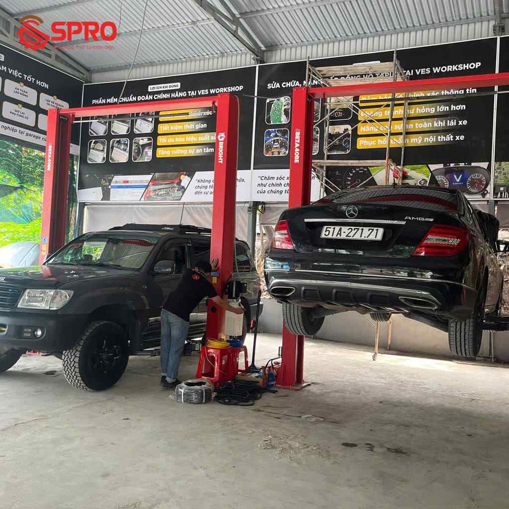 Cầu nâng 2 trụ khi hạ xe